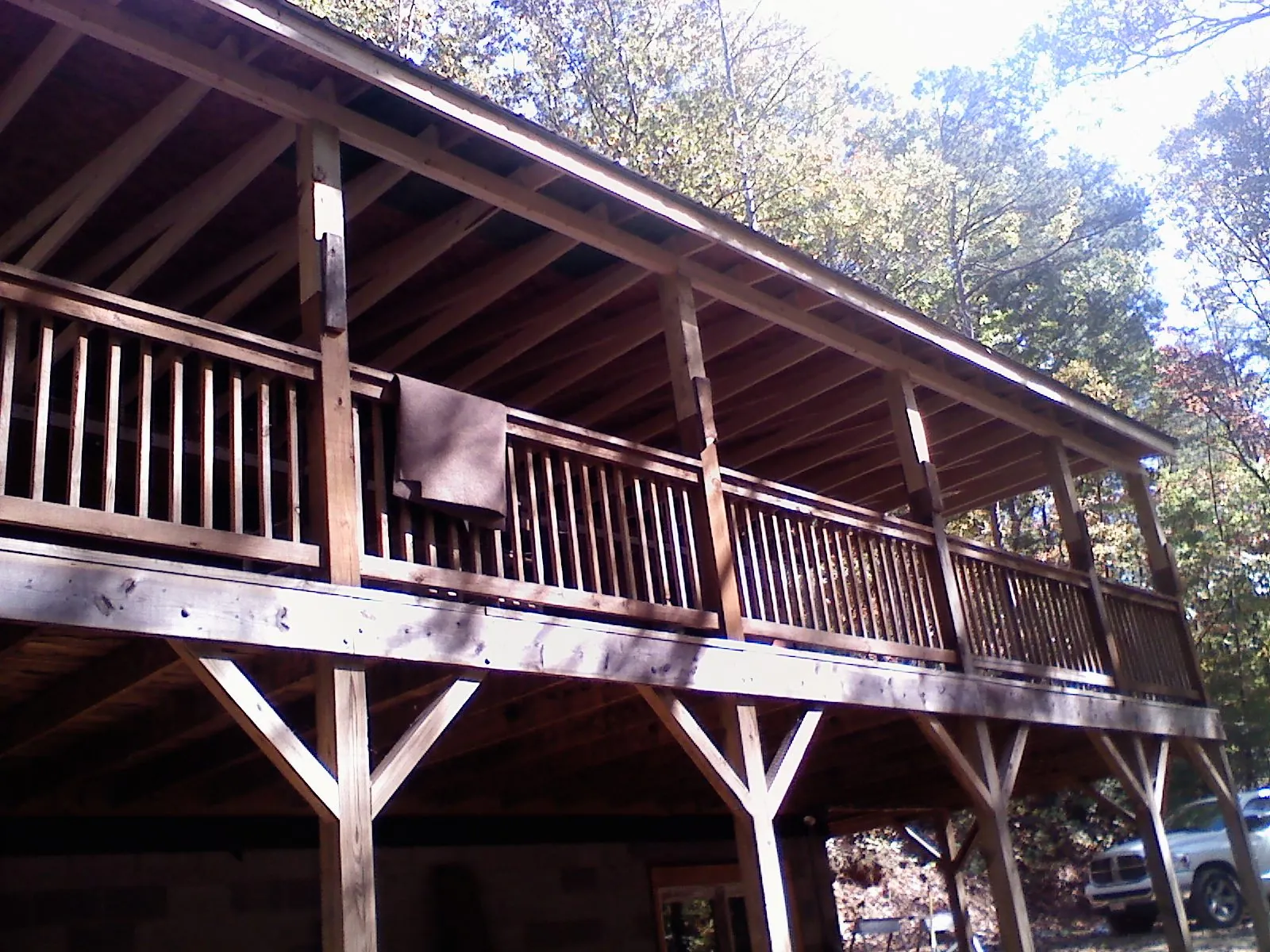 Timber framing under a new elevated porch and deck — Roof Leak Repair in Moneta by Roofing Brothers